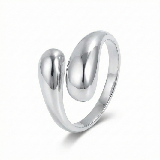 Silver ring with a unique design on a white background